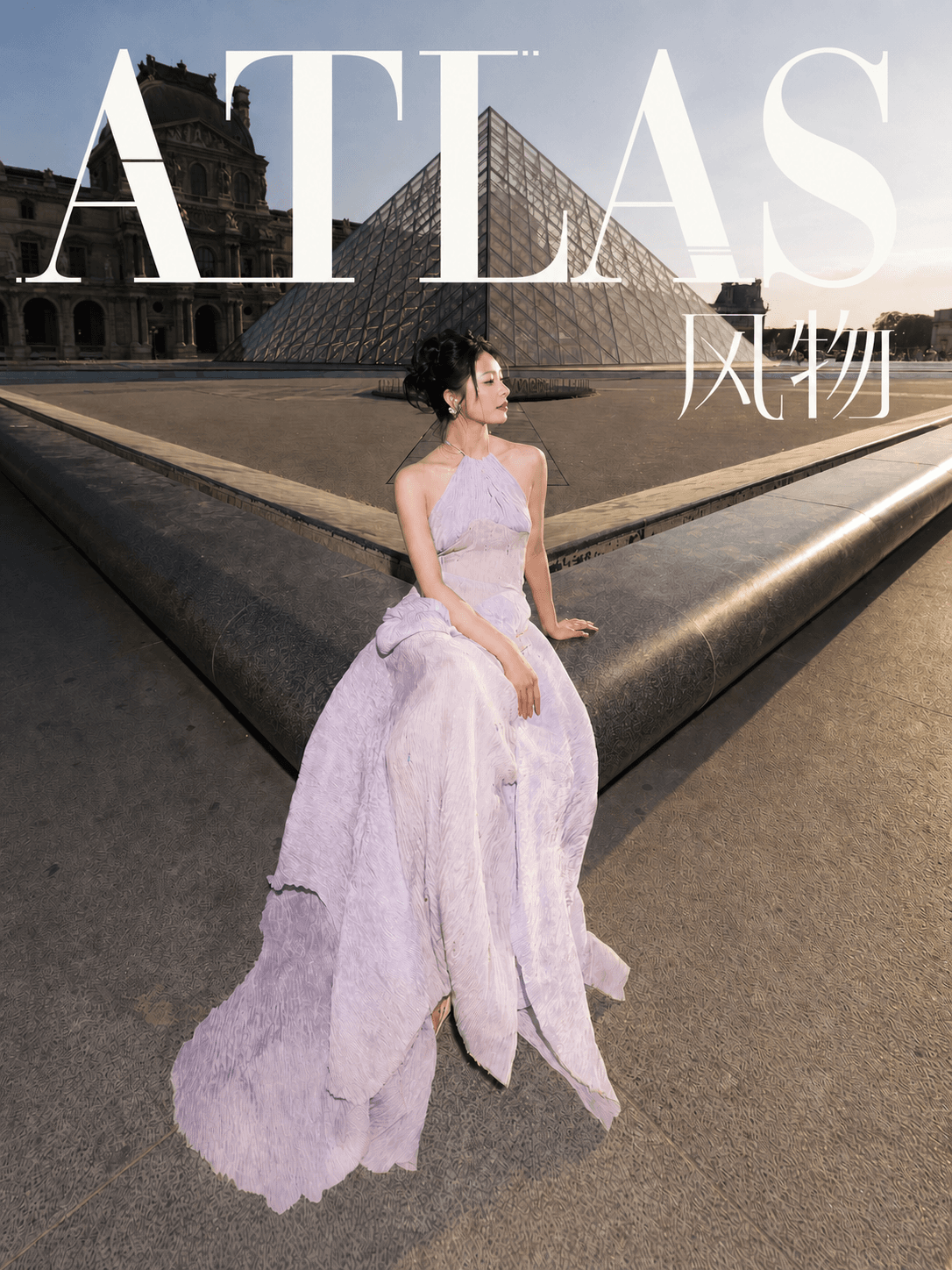 Zhou Jieqiong in a lavender Peet Dullaert silhouette before the Louvre pyramid for ATLAS Issue 02.